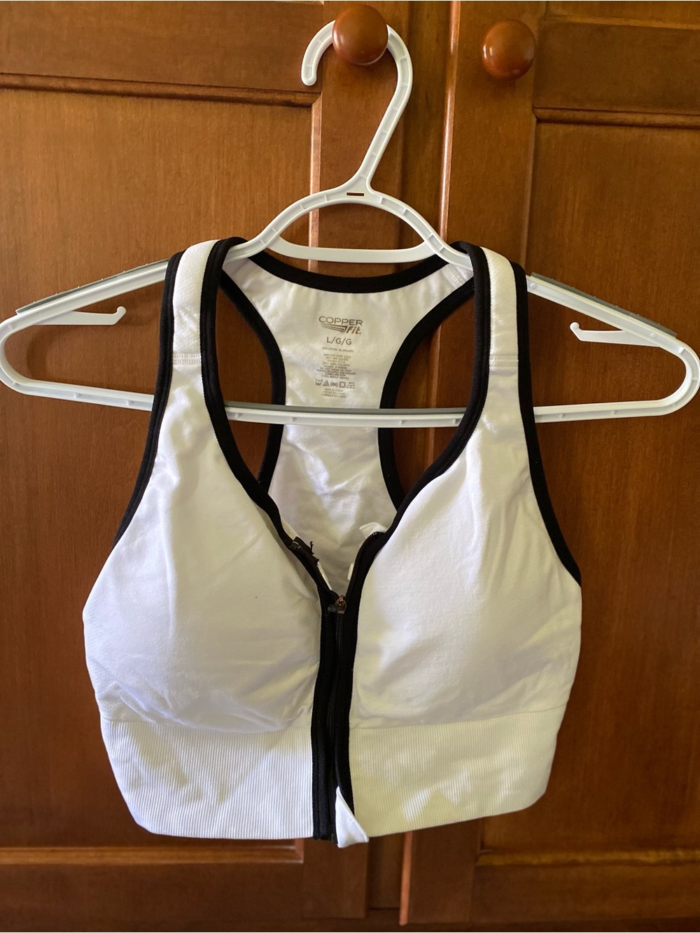 Copper Fit White Front-Zip Racerback Sports Bra with Black Trim, Never Worn.